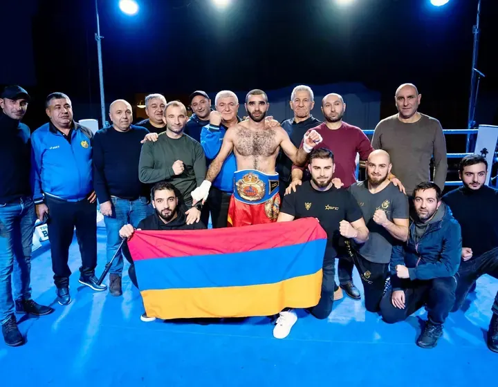 Yuri Sakunts — team and championship belt